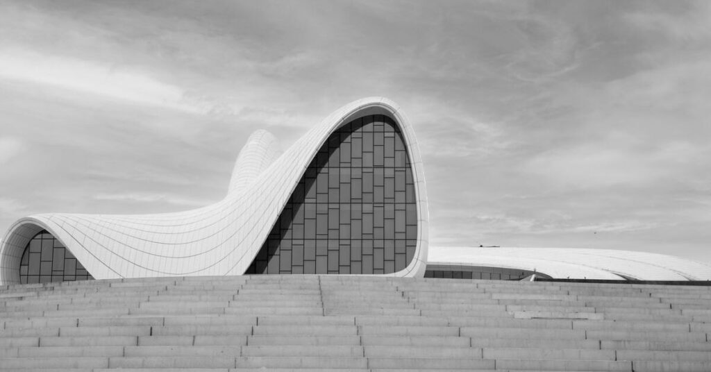 Sweeping curved architectural shell in black and white