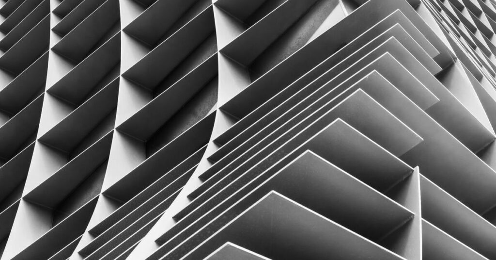 Woven lattice architectural screen in greyscale