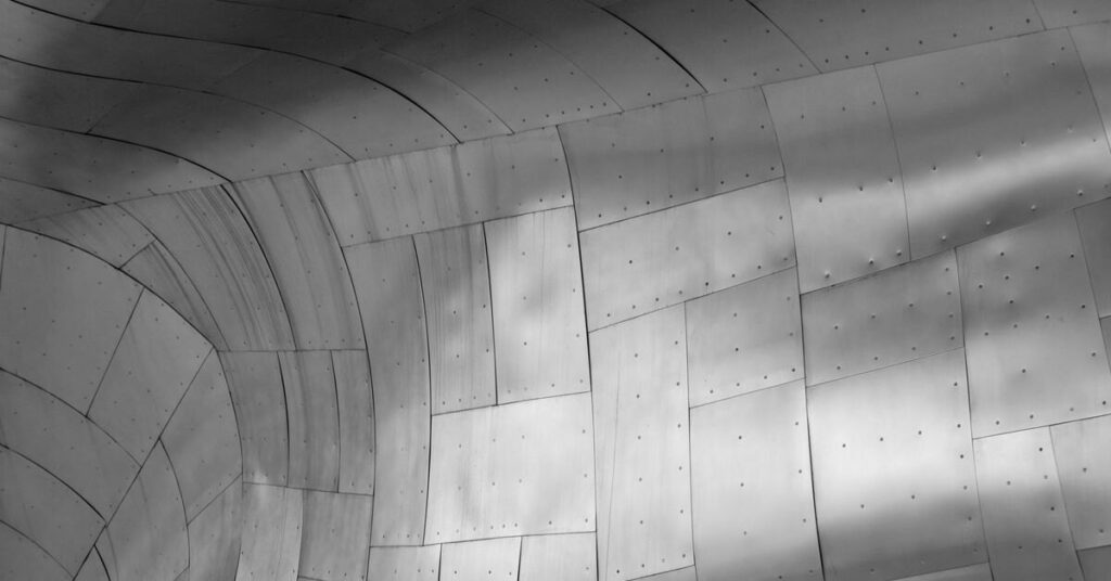 Layered metal shingles in black and white