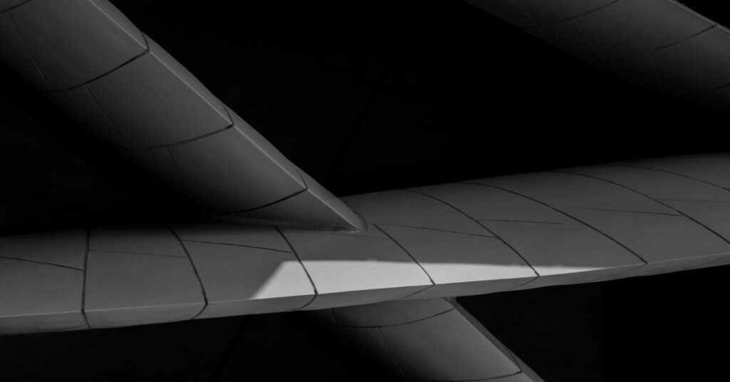 Minimal curved concrete form in soft greyscale