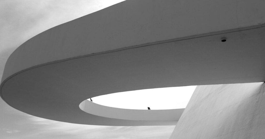 Spiral interior ramp in a minimalist white building
